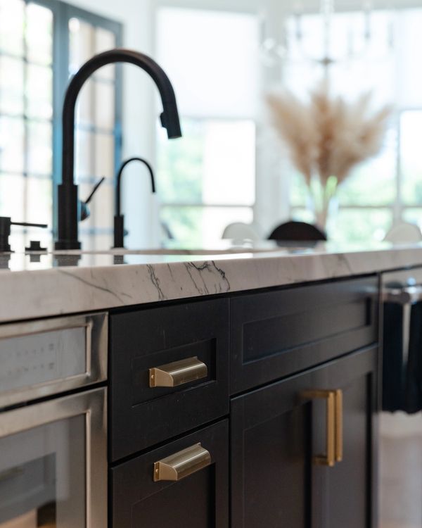 Black kitchen island cabinets.