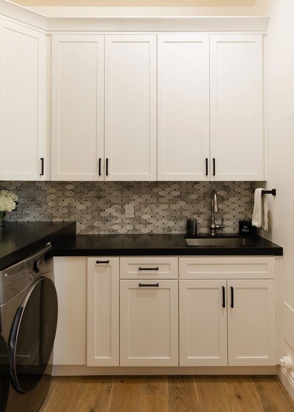 Laundry room custom cabinets for storage.