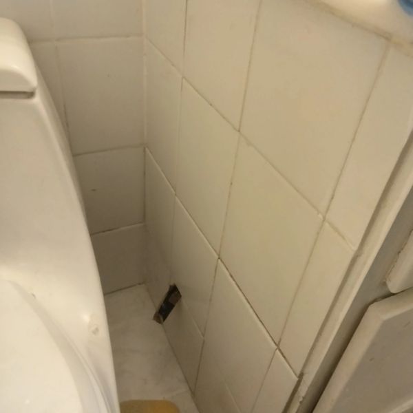 TILE REPAIR TILES RE INSTALLED WITH NEW TILES AND THINSET TO MAKE SURE OF STRONG AND SECURE BOND BY