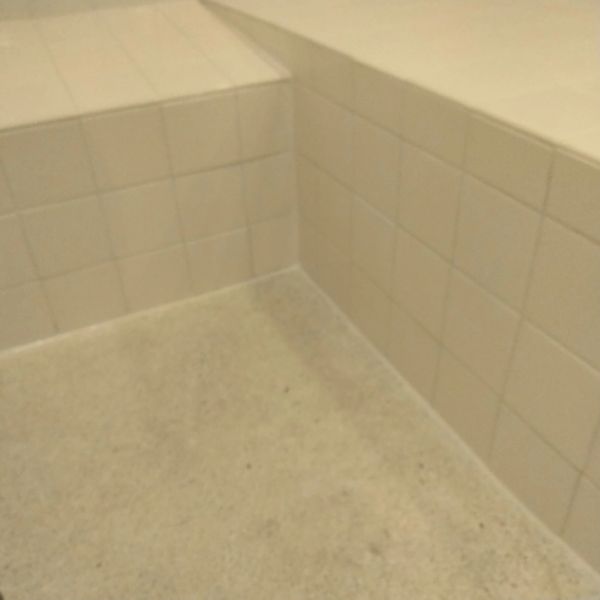 AFTER RE-CAULKING DEEP CLEAN OF GROUT AND TILE AND GROUT COLORING STAIN DYING INSTALL NEW CAULK