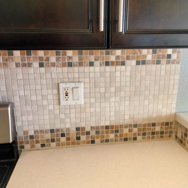 Backsplash photo before removal and new tile installed