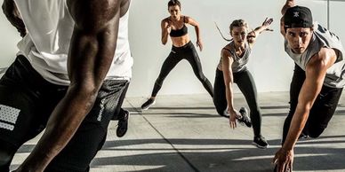 People jumping and running, training HIIT, doing sports.