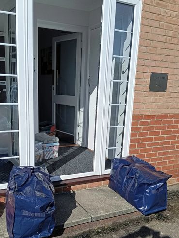 Helping out customer move into their new home .