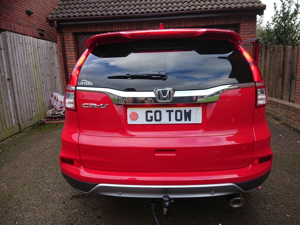 Red Honda CR-V fitted with a detachable Tow-Trust Tow Bar 