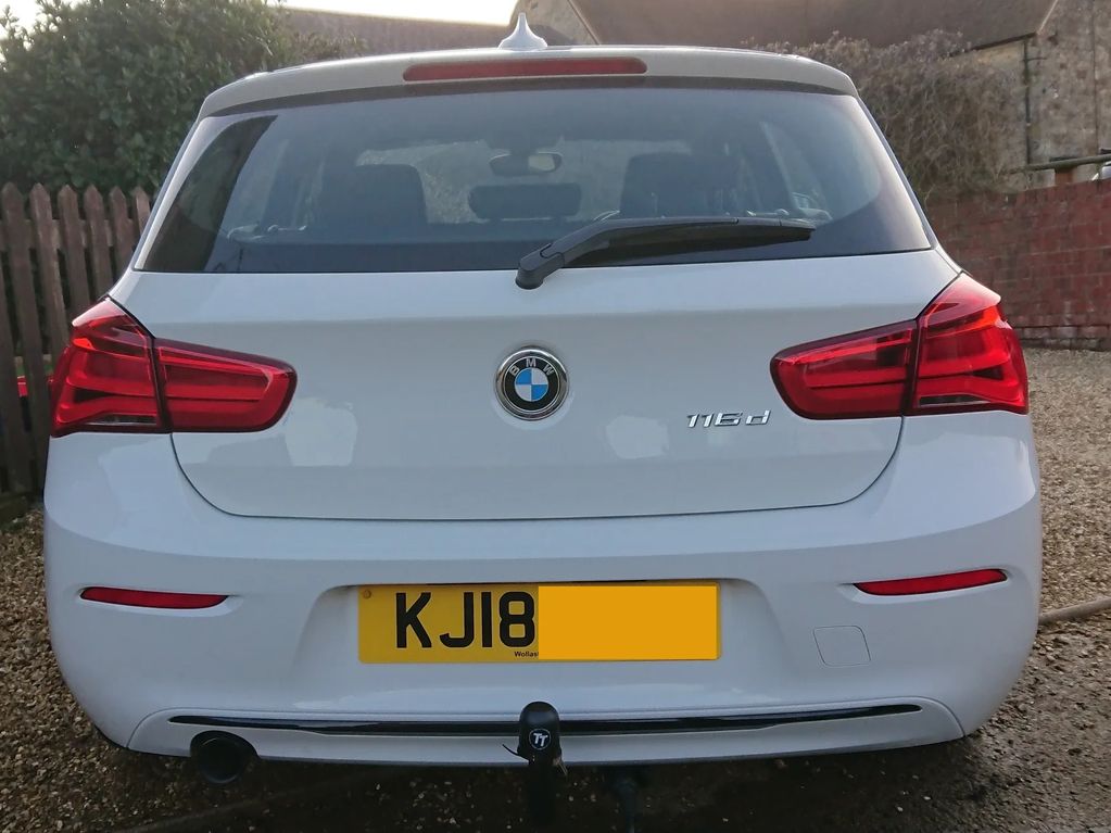 White BMW 116d 2018 fitted with a detachable tow-trust towbar fitted by go-tow ltd
