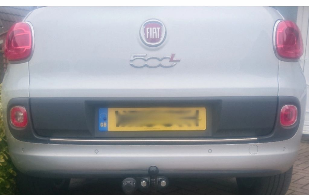 White Fiat 500L fitted with a fixed Tow Bar