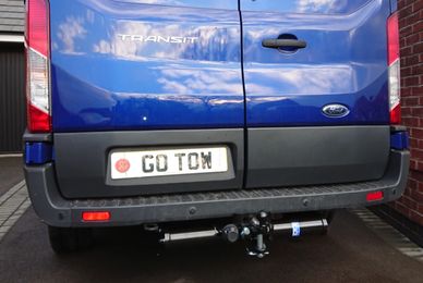 Blue ford transit with a tow-trust towbar fitted by go-tow in oakham
