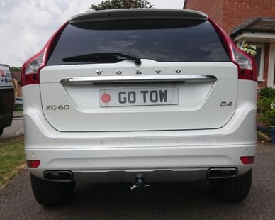 White Volvo XC60 fitted with a detachable towbar fitted in Oundle by Go-Tow