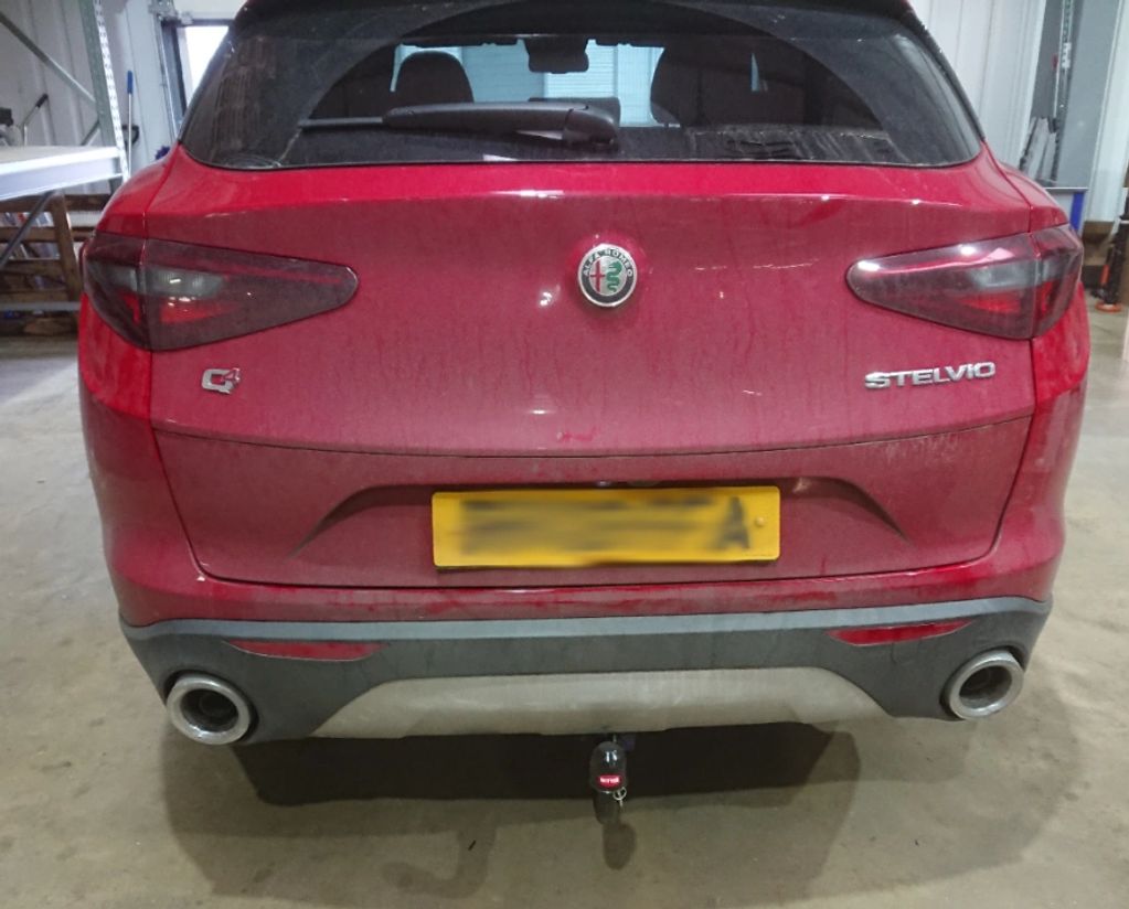 red Alfa romeo Stelvio fitted with a witter detachable towbar by go-tow ltd