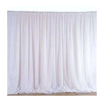 Chiffon backdrop panels in white.