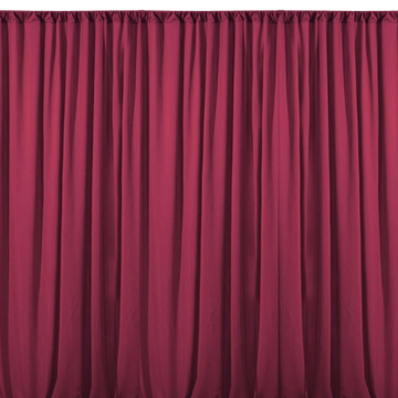 Backdrop panel in maroon.