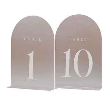 Table numbers with frosted look and white lettering and white numbers.