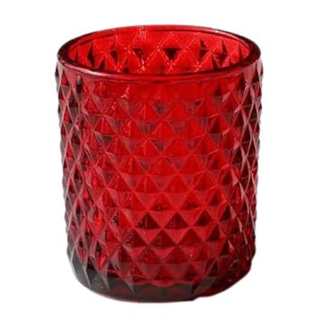 Cylinder shaped red votive candle holder with textured design.