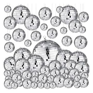 Silver circular disco balls used for table decor with 100 of various sizes.