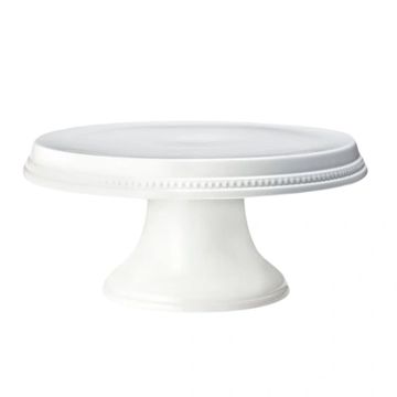 Round white porcelain stand with beaded design used for display.