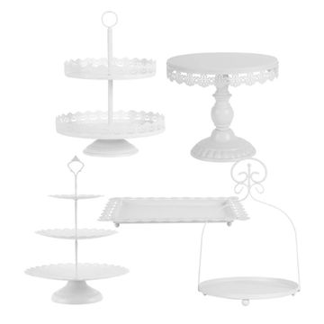 Various different sizes and shaped white display stands.