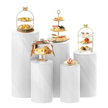 Various different sized cylinder pedestal stands for displaying.