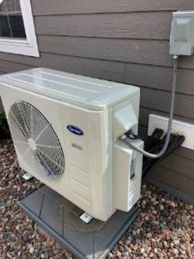 THIS IMAGE SHOWS A HEAT PUMP INSTALLATION AT A LEGAL SUITE IN LANGLEY BRITISH COLUMBIA.