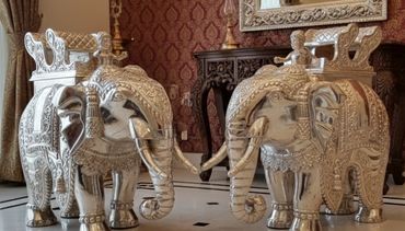 Majestic 34-Inch Silver Cladded Elephant Pair Downward Trunk The Essence of Royal Heritage and Vastu