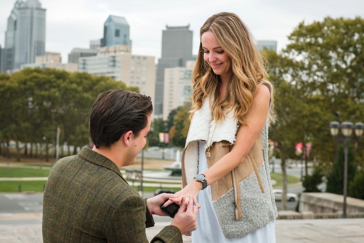 Beautiful marriage proposal at the top of the Art Museum steps in Philadelphia taken by our proposal