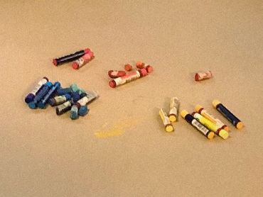 Blank sheet of paper, oil pastels, ready for creating