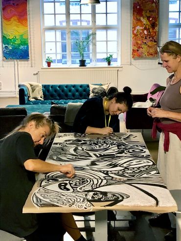 Participants drawing at the "Harmony & Dissonance" session