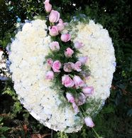Custom floral easels for Celebration of life ceremonies. Giant heart with pink roses and carnations.