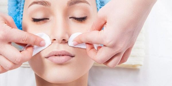 This woman is ending a chemical peel in Ocala, FL 34470 at About Skin Spa. She is calm and happy.