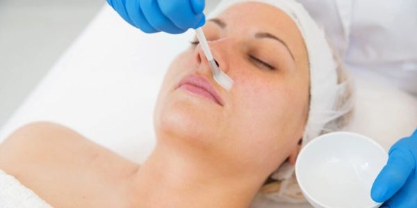 This woman is very calm and happy. She is experiencing a chemical peel at About Skin Spa in Ocala.