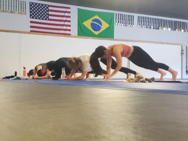 Group working through planks.