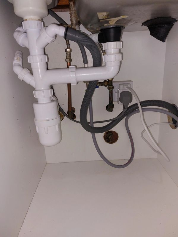 A new dishwasher plumbed in in Hertford