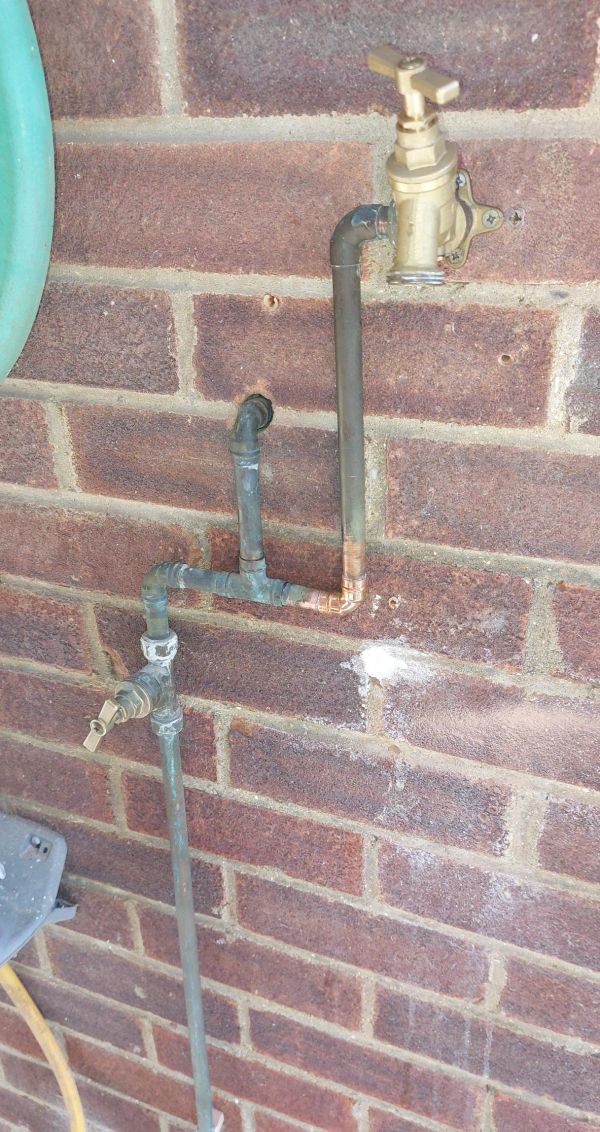An outdoor tap pipework altered and new tap installed in Ware