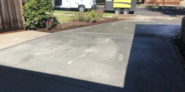 clean power washed cement driveway