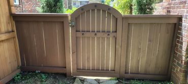 Custom cedar gate and fence installation.