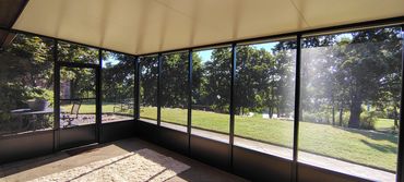 Interior view of aluminum screen room in bronze with kick panels.
