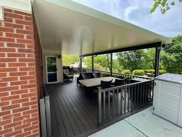 Ivory colored patio cover with insulated roof panels.