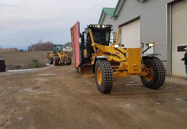 Opérateur niveleuse