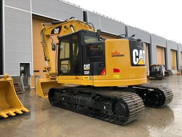 opérateur pelle mécanique Cat-325 axco aménagements