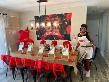 Sip & Paint set up for children customized aprons, hats and give aways