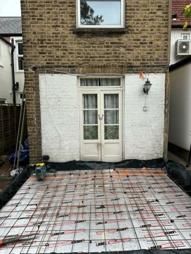 Reinforced concrete slab installation completed as part of the conservatory extension project in Han