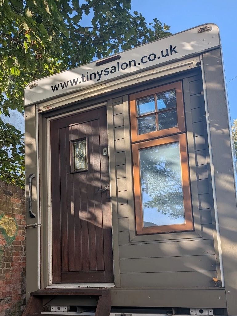 back of the tiny salon, mobile hair salon on wheels that comes to your door. Mobile hairdressing van