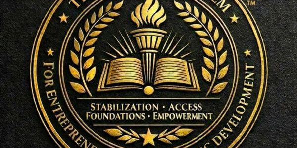 Golden emblem featuring a torch and book symbolizing empowerment and education.