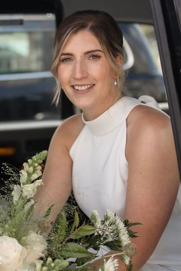 London Bride in taxi about to go to ceremony. Photo by Yioda Nicholaou