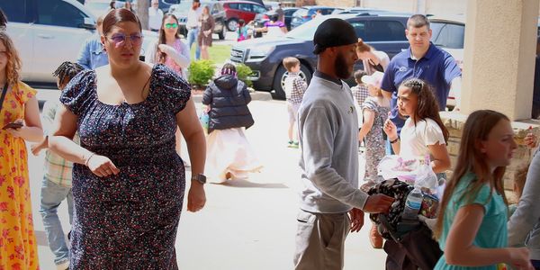 Families are enjoying the weather outside our service.