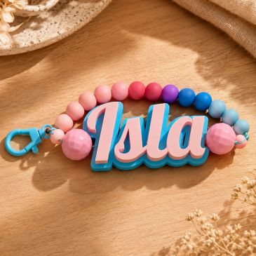 Colorful beaded keychain with the name Isla.