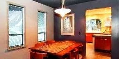 Dark blue ceiling in dining room