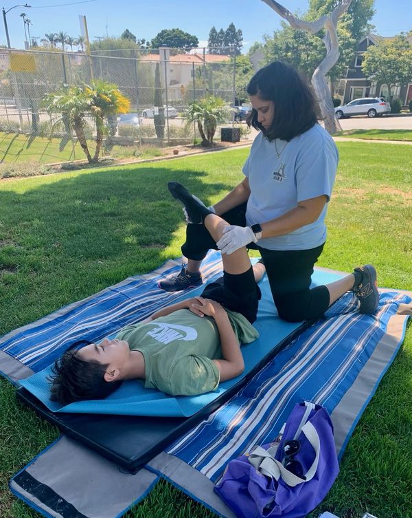 Basketball Athlete - stretching at a park