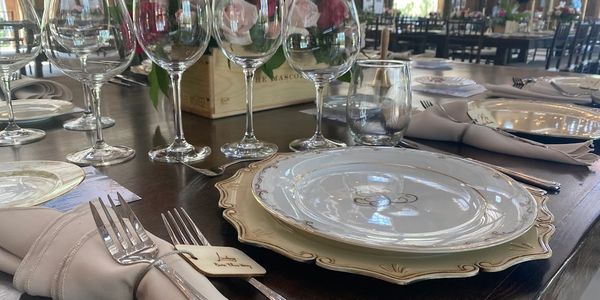 Table settings for wine dinner fundraiser