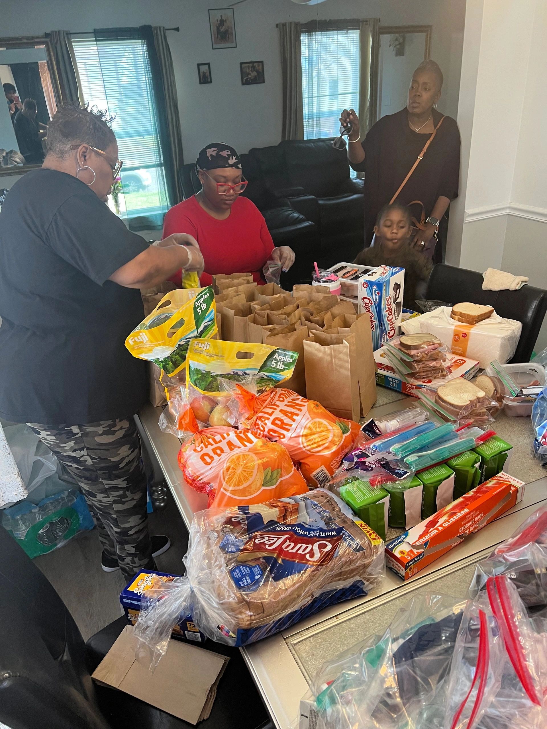 Packing food and hygiene bags for the homeless