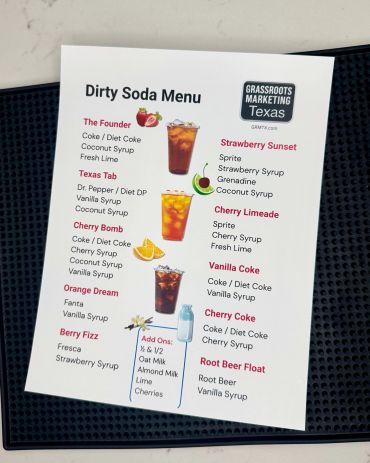 Dirty Soda menu with various flavored soda options and add-ons.